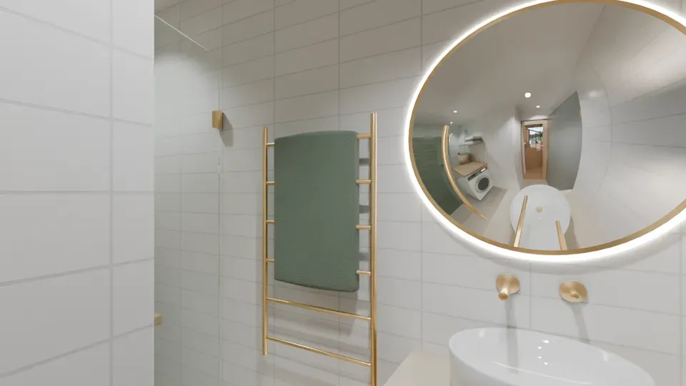 Styled render of the bathroom: a round backlit mirror over a basin, a brass towel rail with a green towel, and white tiled walls, with the washing machine visible in the mirror